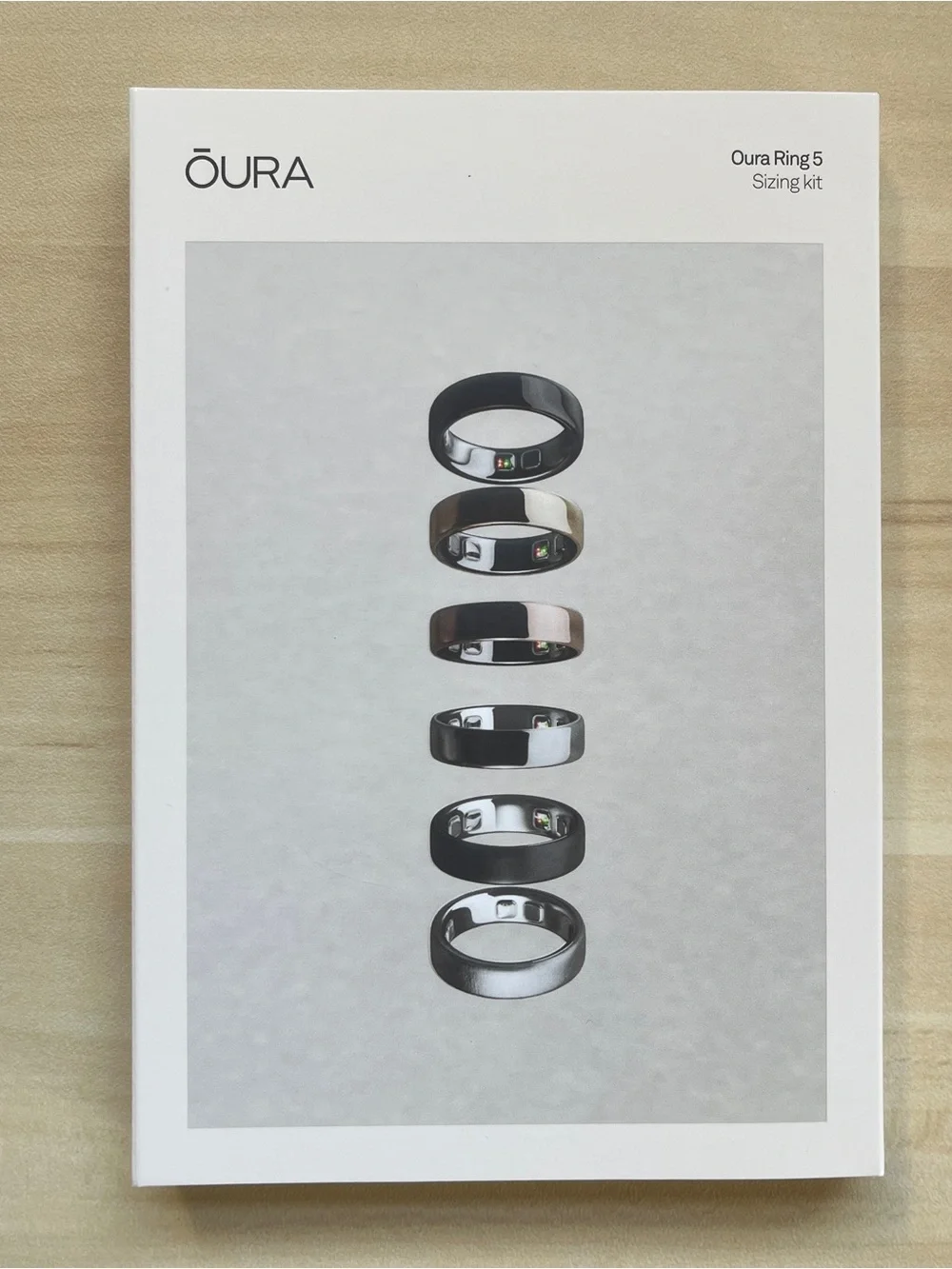 Oura Sizing Kit Packaging — White with Black Text